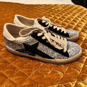 Size 7.5 sneakers. Silver Glitter and black detailing